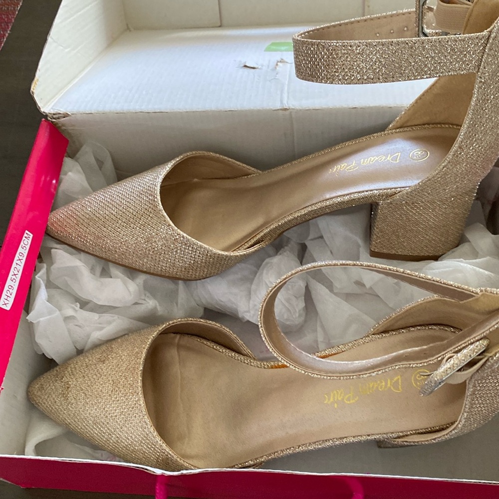 8 1/2 women’s gold glitter 2” ankle buckle strap heels. New/never worn.